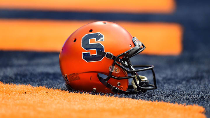 Sep 16, 2017; Syracuse, NY, USA; General view of a Syracuse Orange helmet on the turf prior to the game against the Central Michigan Chippewas at the Carrier Dome. Mandatory Credit: Rich Barnes-Imagn Images