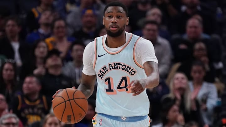 Apr 9, 2025; San Francisco, California, USA;  San Antonio Spurs guard Blake Wesley (14) dribbles the ball upcourt in the third quarter against the Golden State Warriors at Chase Center. Mandatory Credit: David Gonzales-Imagn Images