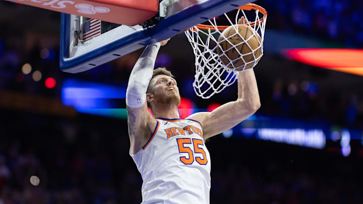 May 2, 2024; Philadelphia, Pennsylvania, USA; New York Knicks center Isaiah Hartenstein (55) dunks the ball against the Philadelphia 76ers during the first half of game six of the first round for the 2024 NBA playoffs at Wells Fargo Center. Mandatory Credit: Bill Streicher-Imagn Images