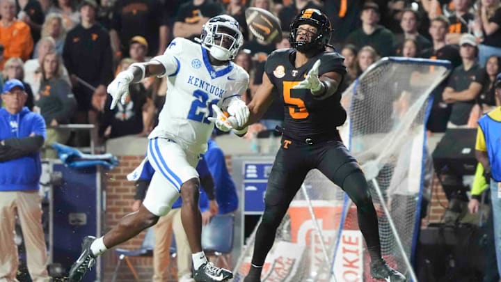 Nov 2, 2024; Knoxville, Tennessee, USA; Tennessee Volunteers wide receiver Bru McCoy (5) cannot catch a pass while defended by Kentucky Wildcats defensive back Nasir Addison (21) during the first half at Neyland Stadium. Mandatory Credit: Caitie McMekin/USA TODAY Network via Imagn Images