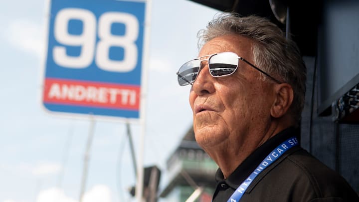 Mario Andretti looks out on the track Friday, May 17, 2024, during Fast Friday ahead of the 108th running of the Indianapolis 500 at Indianapolis Motor Speedway.