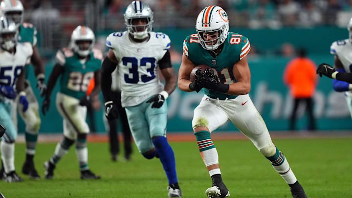 Miami Dolphins tight end Durham Smythe (81) runs with the ball against the Dallas Cowboys during the second half at Hard Rock Stadium in a 2023 game.
