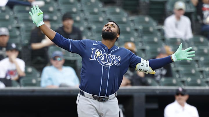 Apr 16, 2026; Chicago, Illinois, USA; Tampa Bay Rays third baseman Junior Caminero (13) celebrates as he rounds the bases after hitting a solo home run against the Chicago White Sox during the ninth inning at Rate Field. 