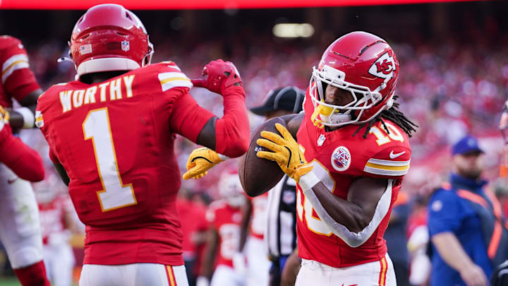Kansas City Chiefs running back Isiah Pacheco (10) celebrates with Kansas City Chiefs wide receiver Xavier Worthy (1) after scoring a touchdown during the first half against the Baltimore Ravens at GEHA Field at Arrowhead Stadium.