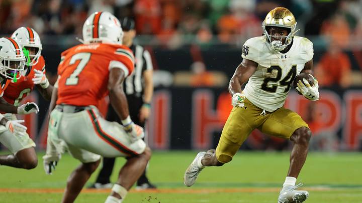 Aug 31, 2025; Miami Gardens, Florida, USA; Notre Dame Fighting Irish running back Jadarian Price (24) rushes the ball against the Miami Hurricanes during the second quarter at Hard Rock Stadium. Aug 31, 2025; Miami Gardens, Florida, USA; Notre Dame Fighting Irish running back Jadarian Price (24) rushes the ball against the Miami Hurricanes during the second quarter at Hard Rock Stadium.