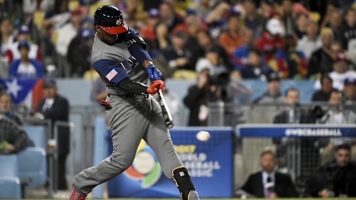 United States right fielder Andrew McCutchen (22) hits an RBI single against Puerto Rico during the fifth inning of the 2017 World Baseball Classic at Dodger Stadium. 
