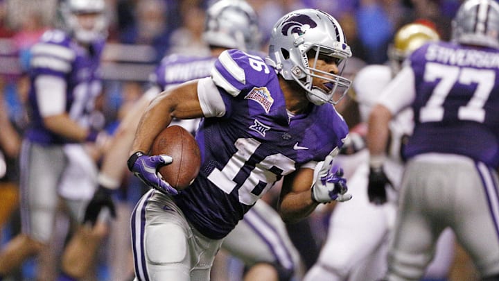 Jan 2, 2015; San Antonio, TX, USA; Kansas State Wildcats wide receiver Tyler Lockett (16) runs after a catch during the second half of the 2015 Alamo Bowl against the UCLA Bruins at Alamodome. The Bruins won 40-35. Mandatory Credit: Soobum Im-USA TODAY Sports