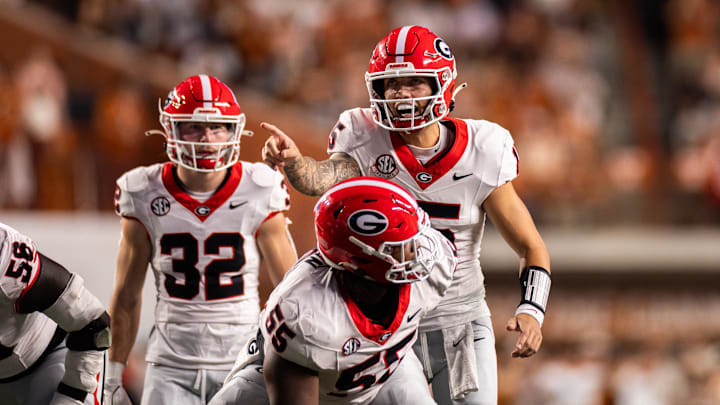 Oct 19, 2024; Austin, Texas, USA; Georgia Bulldogs quarterback Carson Beck (15) directs his offense in the first quarter against the Texas Longhorns at Darrell K Royal-Texas Memorial Stadium. Mandatory Credit: Brett Patzke-Imagn Images