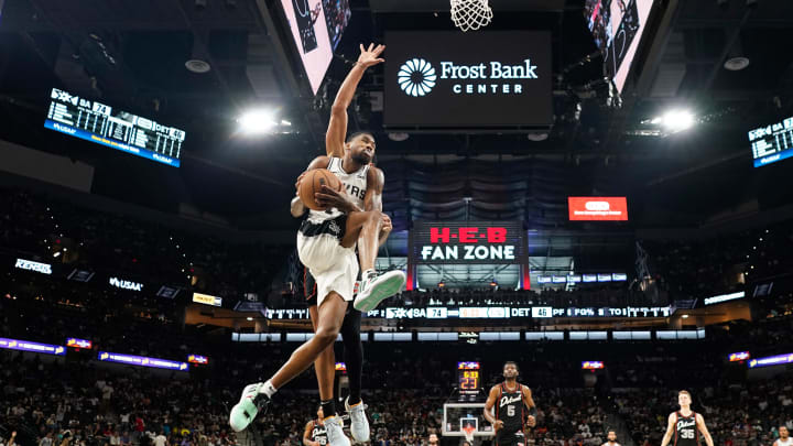Apr 14, 2024; San Antonio, Texas, USA; San Antonio Spurs guard Blake Wesley (14) drives to the basket during the second half against the Detroit Pistons at Frost Bank Center. 