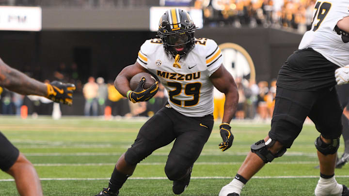 Oct 25, 2025; Nashville, Tennessee, USA;  Missouri Tigers running back Ahmad Hardy (29) runs with the ball against the Vanderbilt Commodores during the first half at FirstBank Stadium. Mandatory Credit: Steve Roberts-Imagn Images