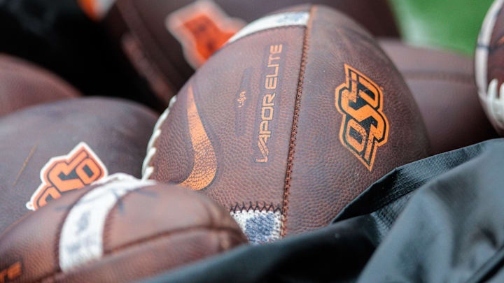 Nov 2, 2024; Stillwater, Oklahoma, USA; Oklahoma State Cowboys footballs on the side lines before a game against the Arizona State Sun Devils at Boone Pickens Stadium. Mandatory Credit: William Purnell-Imagn Images