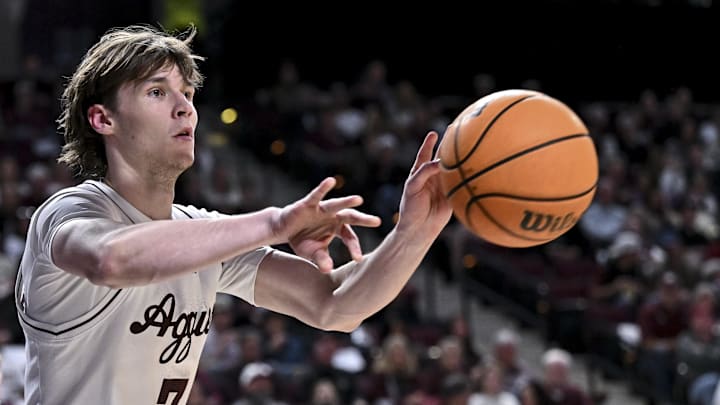 Jan 21, 2026; College Station, Texas, USA; Texas A&M Aggies forward Zach Clemence (7) passes the ball during the second half against the Mississippi State Bulldogs at Reed Arena. Mandatory Credit: Maria Lysaker-Imagn Images 