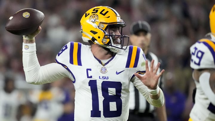 Nov 8, 2025; Tuscaloosa, Alabama, USA;  LSU quarterback Garrett Nussmeier (18) throws a pass during the second half of the game with Alabama at Saban Field at Bryant-Denny Stadium. Alabama defeated LSU 20-9. Mandatory Credit: Gary Cosby Jr.-Imagn Images