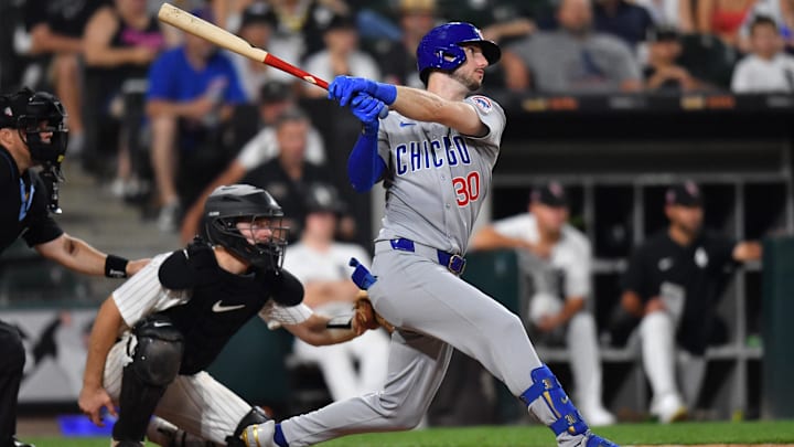 Jul 26, 2025; Chicago, Illinois, USA; Chicago Cubs right fielder Kyle Tucker (30) hits a single during the ninth inning against the Chicago White Sox at Rate Field. 