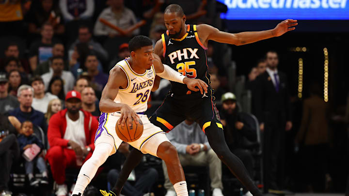 Nov 26, 2024; Phoenix, Arizona, USA; Los Angeles Lakers forward Rui Hachimura (28) against Phoenix Suns forward Kevin Durant (35) during an NBA Cup game at Footprint Center. Mandatory Credit: Mark J. Rebilas-Imagn Images Nov 26, 2024; Phoenix, Arizona, USA; Los Angeles Lakers forward Rui Hachimura (28) against Phoenix Suns forward Kevin Durant (35) during an NBA Cup game at Footprint Center. Mandatory Credit: Mark J. Rebilas-Imagn Images