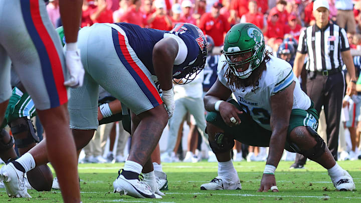 Sep 20, 2025; Oxford, Mississippi, USA; Tulane Green Wave offensive linemen Elijah Baker (73) waits for the snap during the third quarter against the Mississippi Rebels at Vaught-Hemingway Stadium. Mandatory Credit: Petre Thomas-Imagn Images