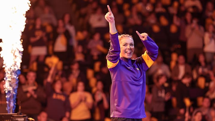 LSU gymnast Livvy Dunne is introduced to the crowd before a meet against Florida at the Pete Maravich Assembly Center in Baton Rouge. LSU gymnast Livvy Dunne is introduced to the crowd before a meet against Florida at the Pete Maravich Assembly Center in Baton Rouge.
