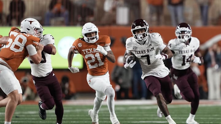 Nov 28, 2025; Austin, Texas, USA; Texas A&M Aggies wide receiver KC Concepcion (7) returns a punt during the first half against the Texas Longhorns at Darrell K Royal-Texas Memorial Stadium. Mandatory Credit: Scott Wachter-Imagn Images Nov 28, 2025; Austin, Texas, USA; Texas A&M Aggies wide receiver KC Concepcion (7) returns a punt during the first half against the Texas Longhorns at Darrell K Royal-Texas Memorial Stadium. Mandatory Credit: Scott Wachter-Imagn Images