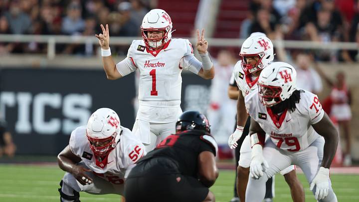 Sep 18, 2026; Lubbock, Texas, USA; Houston Cougars quarterback Conner Weigman (1) signals against the Texas Tech Red Raiders defense in the first half at Galaxy Stadium. Mandatory Credit: Michael C. Johnson-Imagn Images Sep 18, 2026; Lubbock, Texas, USA; Houston Cougars quarterback Conner Weigman (1) signals against the Texas Tech Red Raiders defense in the first half at Galaxy Stadium. Mandatory Credit: Michael C. Johnson-Imagn Images
