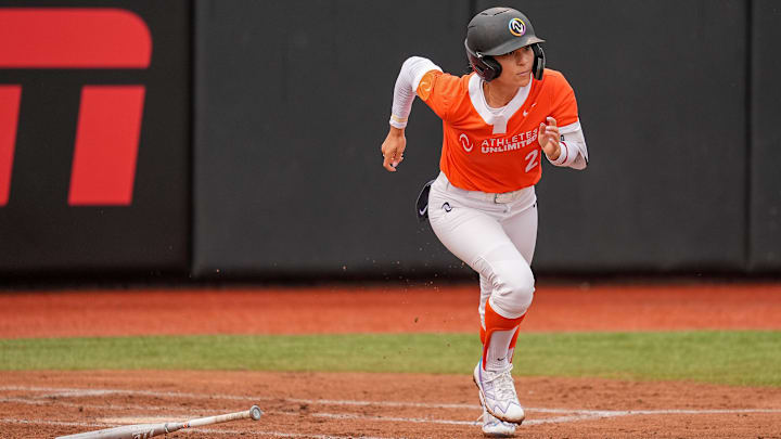 Talons second baseman Sydney Romero hits a double as a Team Kilfoyl member during an Athletes Unlimited Pro (now known as the All-Star Cup) game at Max R. Joyner Family Stadium on Aug. 7, 2024 in Greenville, N.C.