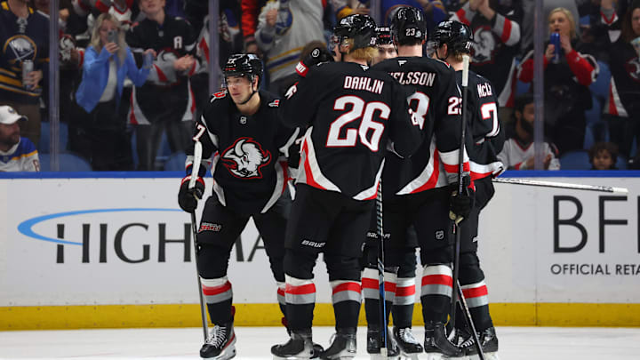Apr 17, 2025; Buffalo, New York, USA;  Buffalo Sabres right wing JJ Peterka (77) celebrates his goal with teammates during the third period against the Philadelphia Flyers at KeyBank Center. Mandatory Credit: Timothy T. Ludwig-Imagn Images