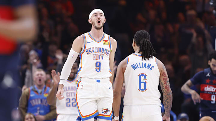 Dec 23, 2024; Oklahoma City, Oklahoma, USA; Oklahoma City Thunder guard Alex Caruso (9) celebrates after his team scores against the Washington Wizards during the second quarter at Paycom Center. Mandatory Credit: Alonzo Adams-Imagn Images