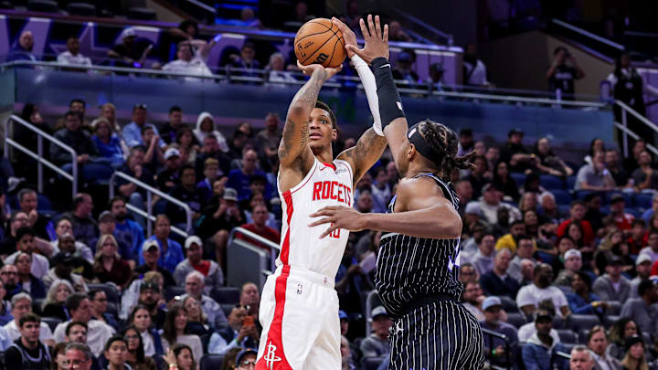 Feb 26, 2026; Orlando, Florida, USA; Houston Rockets forward Jabari Smith Jr. (10) shoots against Orlando Magic center Wendell Carter Jr. (34) during the second half at Kia Center. Mandatory Credit: Mike Watters-Imagn Images