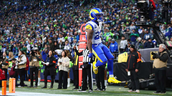 Jan 25, 2026; Seattle, WA, USA; Los Angeles Rams running back Kyren Williams (23) celebrates scoring a touchdown against the Seattle Seahawks during the first half in the 2026 NFC Championship Game at Lumen Field. Mandatory Credit: Kevin Ng-Imagn Images