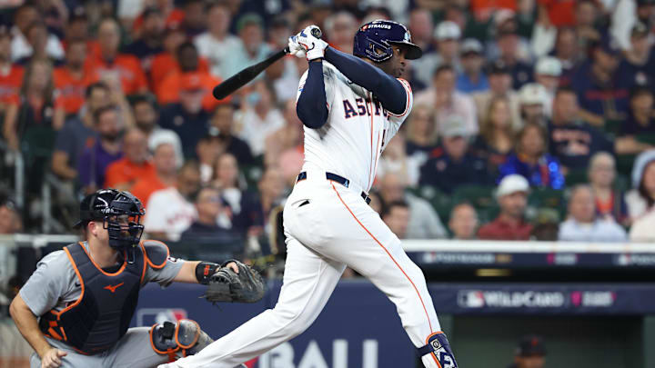 Oct 1, 2024; Houston, Texas, USA; Houston Astros outfielder Yordan Alvarez (44) hits a single against the Detroit Tigers in game one of the Wild Card round for the 2024 MLB Playoffs at Minute Maid Park. 