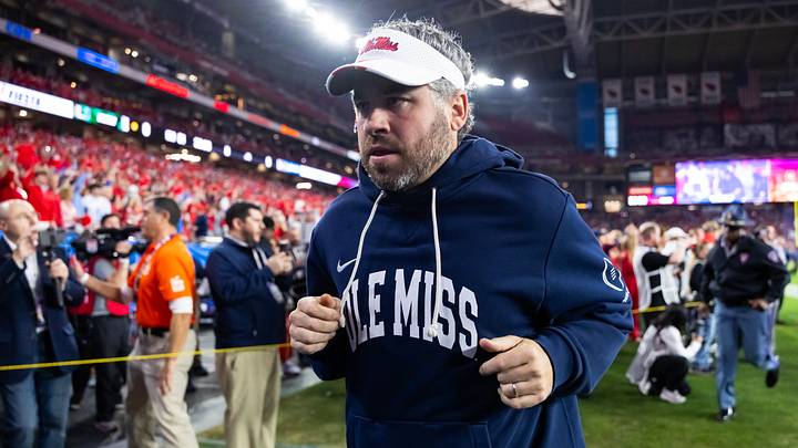 Jan 8, 2026; Glendale, AZ, USA; Mississippi Rebels head coach Pete Golding against the Miami Hurricanes during the 2026 Fiesta Bowl and semifinal game of the College Football Playoff at State Farm Stadium. Mandatory Credit: Mark J. Rebilas-Imagn Images Jan 8, 2026; Glendale, AZ, USA; Mississippi Rebels head coach Pete Golding against the Miami Hurricanes during the 2026 Fiesta Bowl and semifinal game of the College Football Playoff at State Farm Stadium. Mandatory Credit: Mark J. Rebilas-Imagn Images