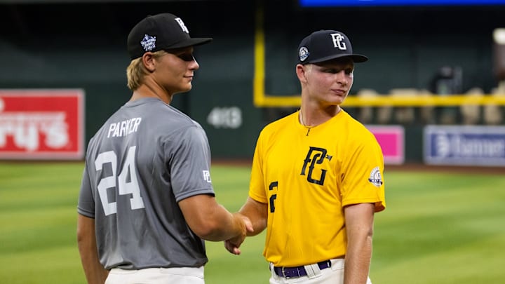 Purvis High School outfielder Jacob Parker (left) with brother and shortstop Joseph Parker during the Perfect Game National Showcase high school baseball game at Chase Field. Mandatory Credit: Mark J. Rebilas-Imagn Images