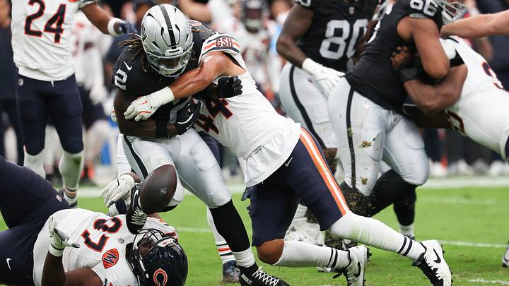 Sep 28, 2025; Paradise, Nevada, USA; Chicago Bears linebacker Noah Sewell (44) tackles Las Vegas Raiders running back Ashton Jeanty (2) during the first quarter at Allegiant Stadium. Mandatory Credit: Kiyoshi Mio-Imagn Images Sep 28, 2025; Paradise, Nevada, USA; Chicago Bears linebacker Noah Sewell (44) tackles Las Vegas Raiders running back Ashton Jeanty (2) during the first quarter at Allegiant Stadium. Mandatory Credit: Kiyoshi Mio-Imagn Images