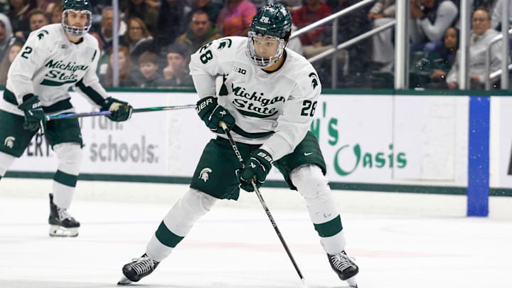 Blue Jackets prospect Cayden Lindstrom looks to make a play with the puck. 