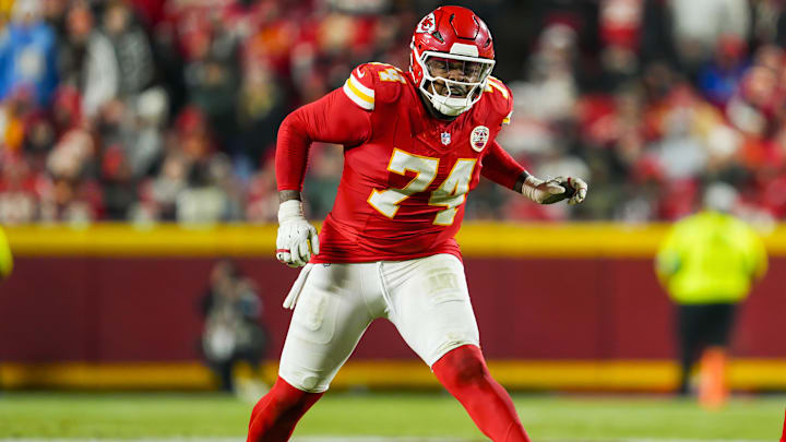 Dec 8, 2024; Kansas City, Missouri, USA; Kansas City Chiefs offensive tackle Jawaan Taylor (74) gets ready to block during the second half against the Los Angeles Chargers at GEHA Field at Arrowhead Stadium. Mandatory Credit: Jay Biggerstaff-Imagn Images