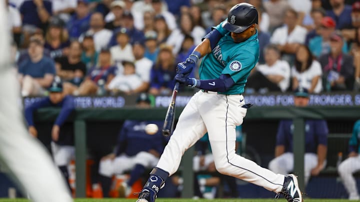 Seattle Mariners second baseman Jorge Polanco hits a single against the Philadelphia Phillies on Aug. 3 at T-Mobile Park.