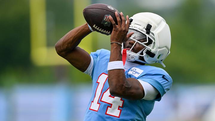 Aug 3, 2026; Nashville, TN, USA; Tennessee Titans wider receiver Carnell Tate (14) makes a catch during training camp at Vanderbilt Health Football Center. Mandatory Credit: Steve Roberts-Imagn Images Aug 3, 2026; Nashville, TN, USA; Tennessee Titans wider receiver Carnell Tate (14) makes a catch during training camp at Vanderbilt Health Football Center. Mandatory Credit: Steve Roberts-Imagn Images