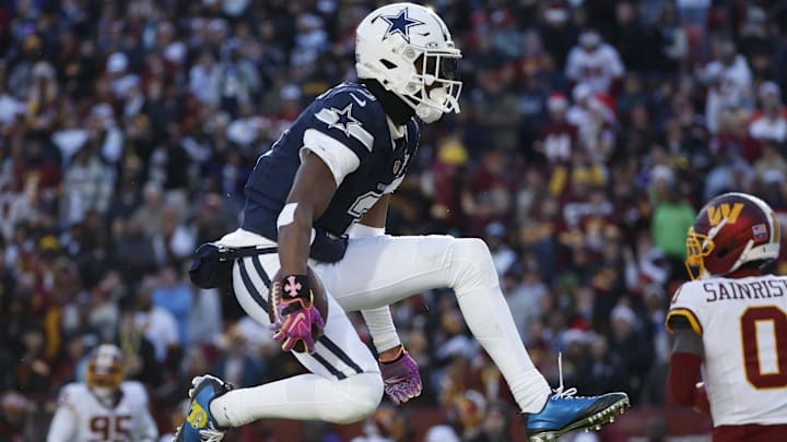 Dallas Cowboys wide receiver George Pickens celebrates after a play against the Washington Commanders.