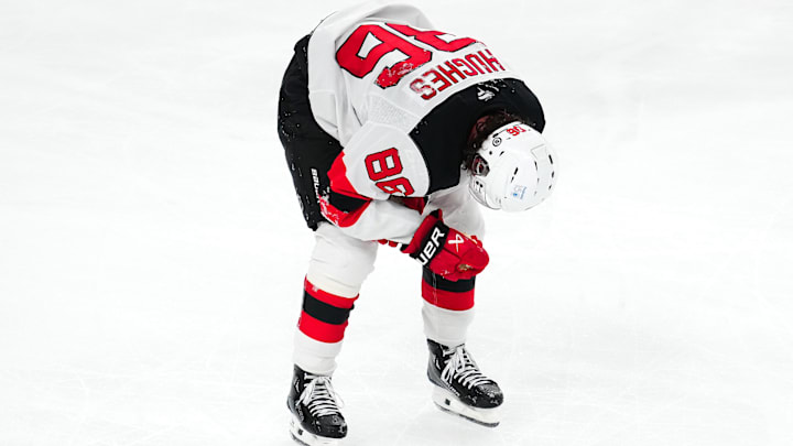 Mar 2, 2025; Las Vegas, Nevada, USA; New Jersey Devils center Jack Hughes (86) makes his way off the ice after sustaining an apparent injury during a play against the Vegas Golden Knights during the third period at T-Mobile Arena. Mandatory Credit: Stephen R. Sylvanie-Imagn Images