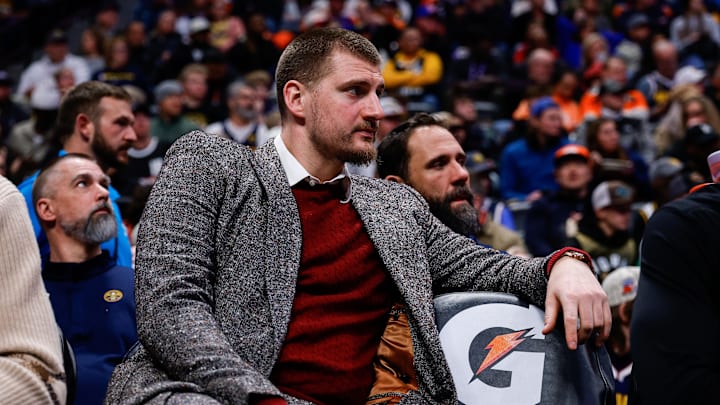 Jan 17, 2026; Denver, Colorado, USA; Denver Nuggets center Nikola Jokic (15) looks on from the bench in the third quarter against the Washington Wizards at Ball Arena. Mandatory Credit: Isaiah J. Downing-Imagn Images