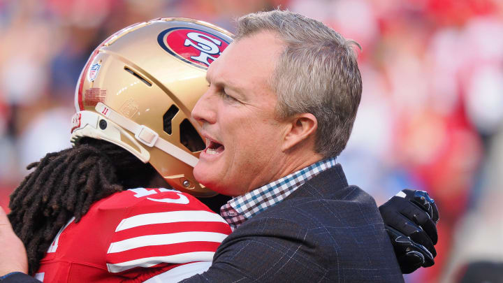 Jan 28, 2024; Santa Clara, California, USA; San Francisco 49ers general manager John Lynch hugs a