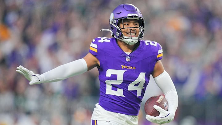 Dec 29, 2024; Minneapolis, Minnesota, USA; Minnesota Vikings safety Camryn Bynum (24) celebrates his fumble recovery against Green Bay Packers in the first quarter at U.S. Bank Stadium. 