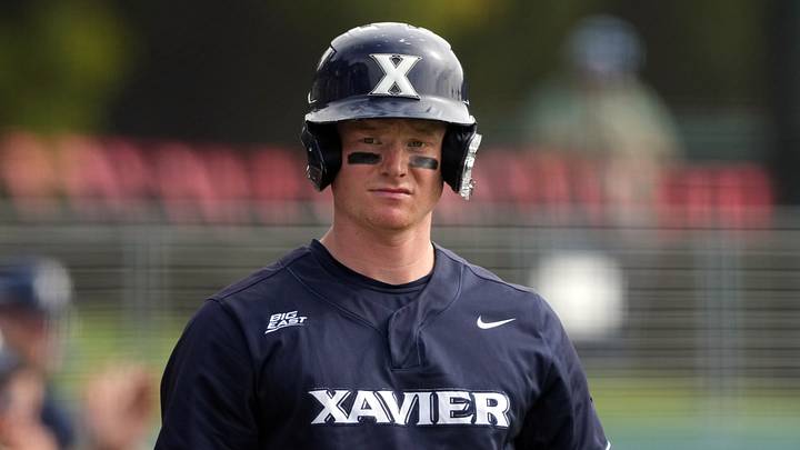 Feb 28, 2025; Stanford, CA, USA; Xavier Musketeers right fielder Clay Burdette (5) during the first inning against the Stanford Cardinal at Sunken Diamond. Mandatory Credit: Darren Yamashita-Imagn Images Feb 28, 2025; Stanford, CA, USA; Xavier Musketeers right fielder Clay Burdette (5) during the first inning against the Stanford Cardinal at Sunken Diamond. Mandatory Credit: Darren Yamashita-Imagn Images