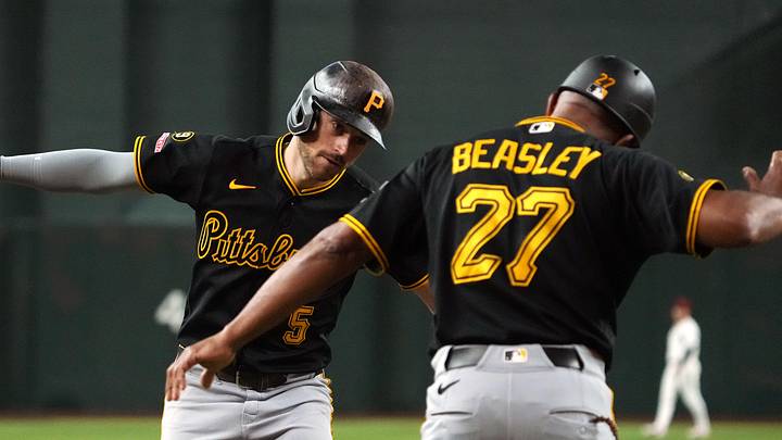 May 7, 2026; Phoenix, Arizona, USA; Pittsburgh Pirates second baseman Brandon Lowe (5) hits a solo home run against the Arizona Diamondbacks in the first inning at Chase Field. Mandatory Credit: Rick Scuteri-Imagn Images