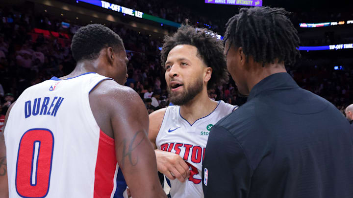 Mar 19, 2025; Miami, Florida, USA; Detroit Pistons guard Cade Cunningham (2) celebrates with center Jalen Duren (0) after the game against the Miami Heat at Kaseya Center. Mandatory Credit: Sam Navarro-Imagn Images