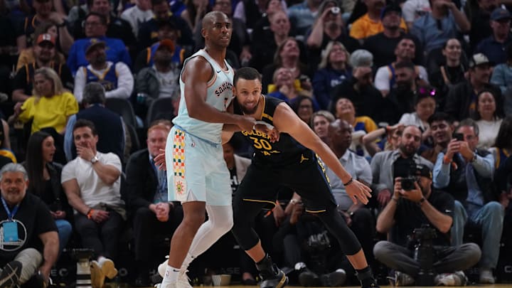 Apr 9, 2025; San Francisco, California, USA;  San Antonio Spurs guard Chris Paul (3) is guarded by Golden State Warriors guard Stephen Curry (30) in the second period at Chase Center. Mandatory Credit: David Gonzales-Imagn Images