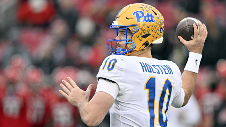 Nov 23, 2024; Louisville, Kentucky, USA; Pittsburgh Panthers quarterback Eli Holstein (10) throws against the Louisville Cardinals during the first quarter at L&N Federal Credit Union Stadium. Mandatory Credit: Jamie Rhodes-Imagn Images Nov 23, 2024; Louisville, Kentucky, USA; Pittsburgh Panthers quarterback Eli Holstein (10) throws against the Louisville Cardinals during the first quarter at L&N Federal Credit Union Stadium. Mandatory Credit: Jamie Rhodes-Imagn Images