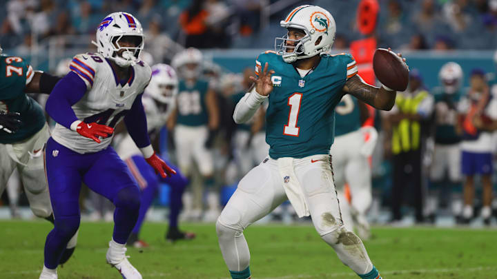 Sep 12, 2024; Miami Gardens, Florida, USA; Miami Dolphins quarterback Tua Tagovailoa (1) throws the football against the Buffalo Bills during the third quarter at Hard Rock Stadium. Mandatory Credit: Sam Navarro-Imagn Images