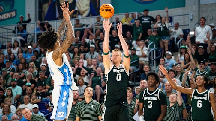 Michigan State Spartans forward Jaxon Kohler (0) shoots a three point basket during the second half of the Fort Myers Tip-Off Beach Division game against the North Carolina Tar Heels at Suncoast Credit Union Arena on Fort Myers, Fla., on Thursday, Nov. 27, 2025.