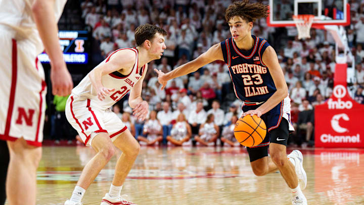 Illinois guard Keaton Wagler drives against Nebraska forward Pryce Sandfort  during the second half at Pinnacle Bank Arena. 
