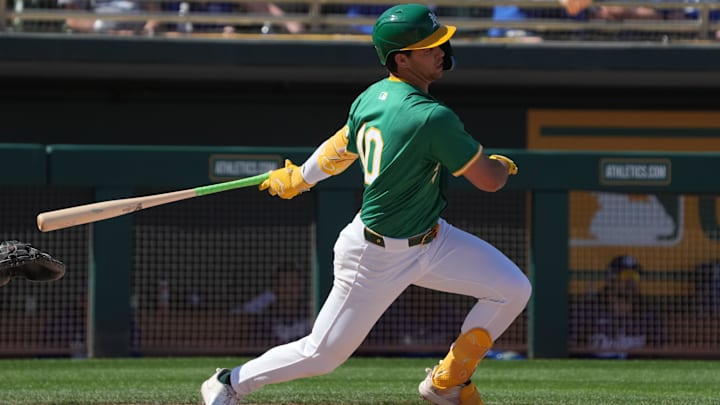 Mar 2, 2025; Mesa, Arizona, USA; Oakland Athletics Max Muncy hits against the Los Angeles Dodgers in the third inning at Hohokam Stadium. Mandatory Credit: Rick Scuteri-Imagn Images Mar 2, 2025; Mesa, Arizona, USA; Oakland Athletics Max Muncy hits against the Los Angeles Dodgers in the third inning at Hohokam Stadium. Mandatory Credit: Rick Scuteri-Imagn Images